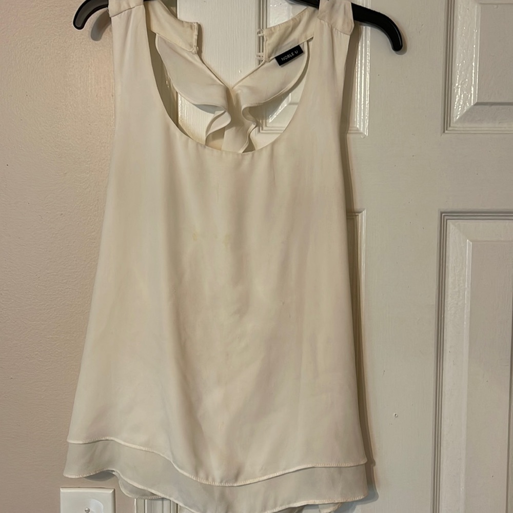 White tank! Cute ruffled line in back!
